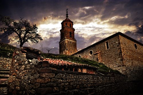 Village church above the rooftops
