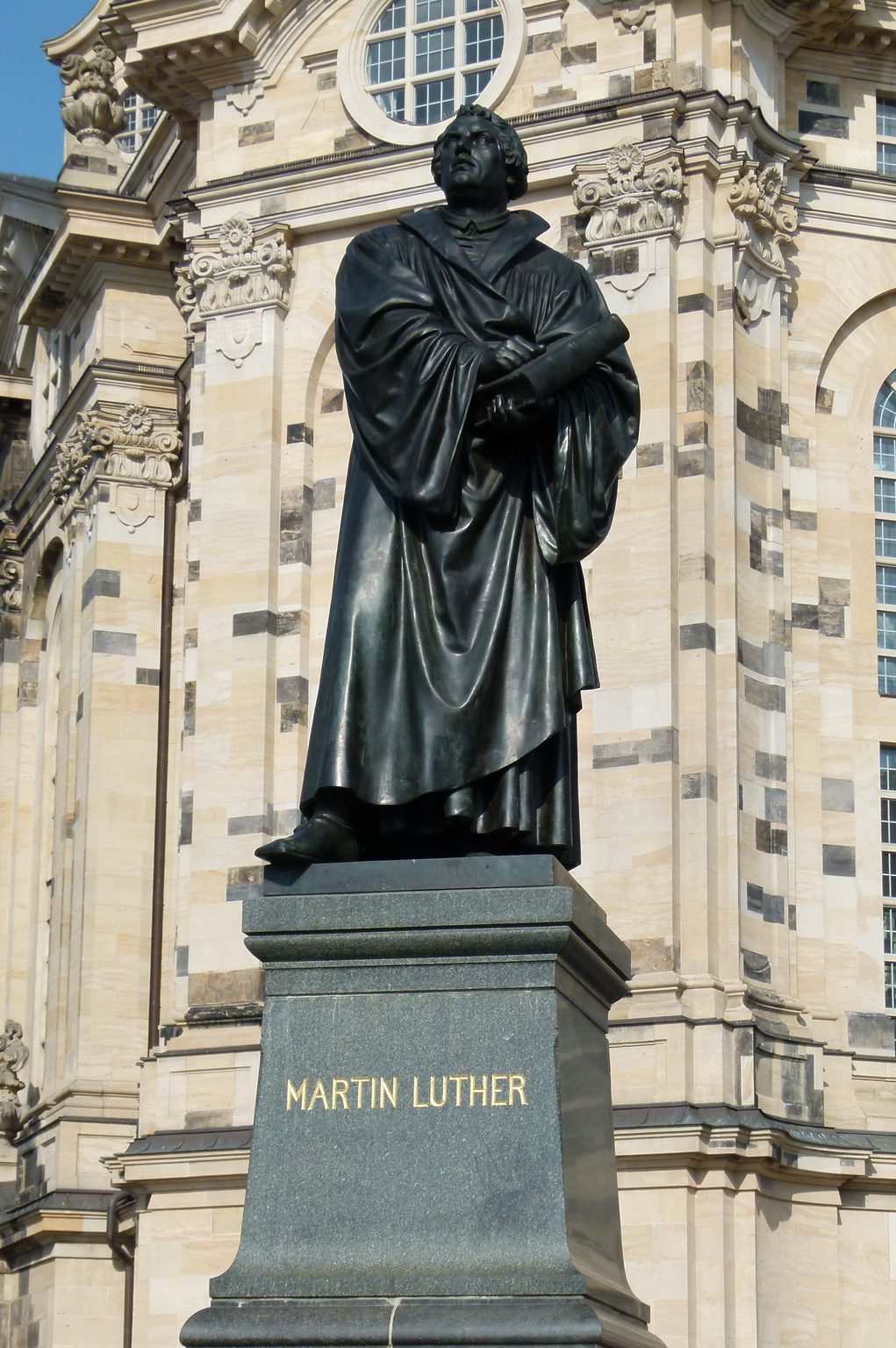 Monument in front of a baroque church