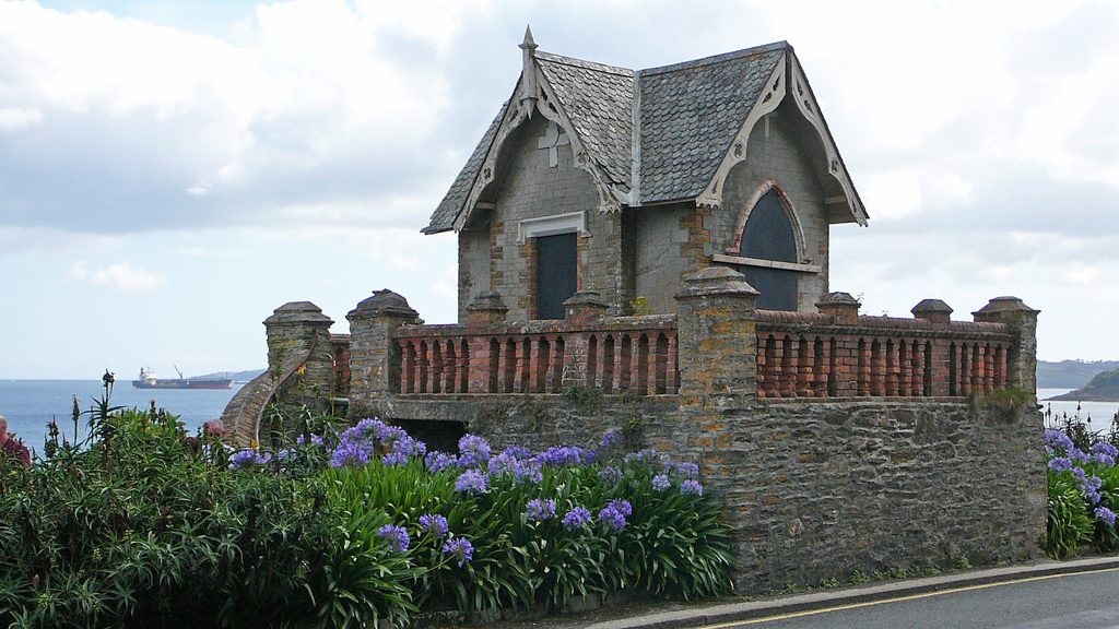 Boarded-up chapel by the sea